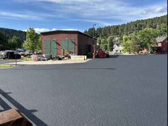 MCD Asphalt sealcoat commercial parking lot install